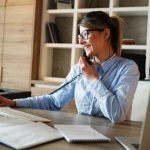 woman-taking-phone-payment-1200x650px-600x325